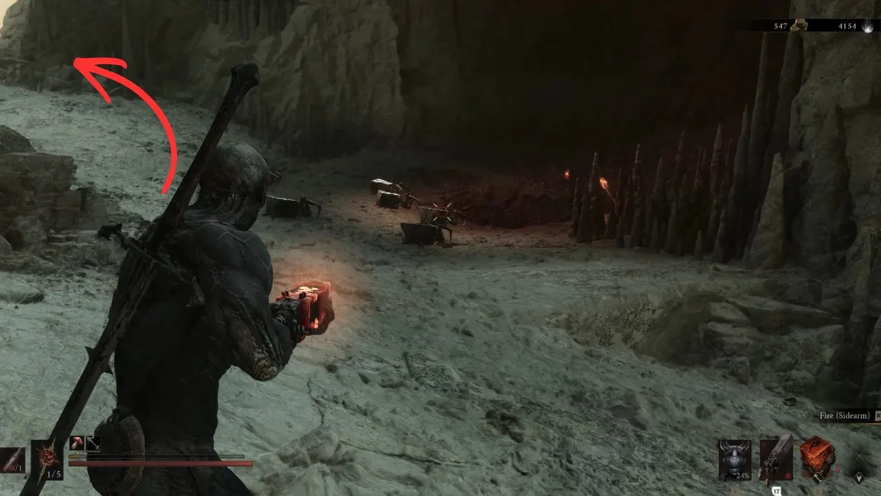 Image showing a Mortal Shell 2 player looking at a pack of Lithopods, with an arrow pointing at the direction to follow