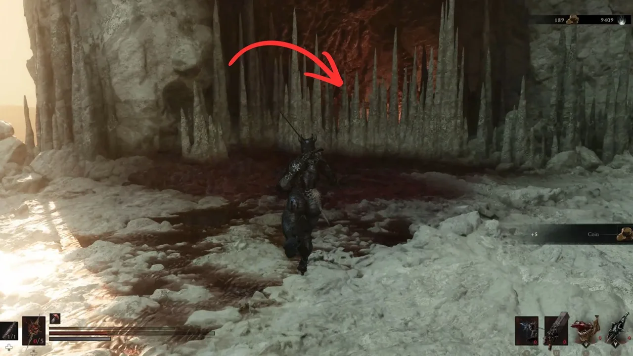 Image showing a Mortal Shell 2 player approaching an Illusory wall of Stalagmited, pointed at with a red arrow