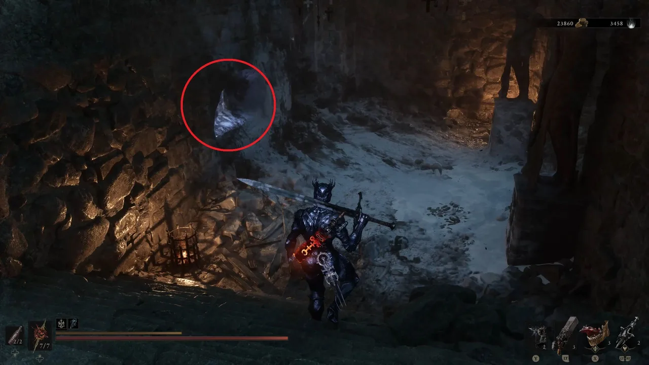 Image showing a Mortal Shell 2 player walking down the stairs of the entrance zone to the gate, approaching the Martyr's Ash on the left, circled in red