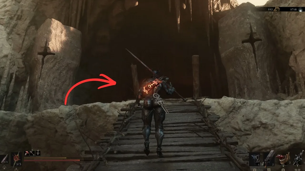 Image showing a Mortal Shell 2 player heading to a Maw-shaped cave to continue progressing