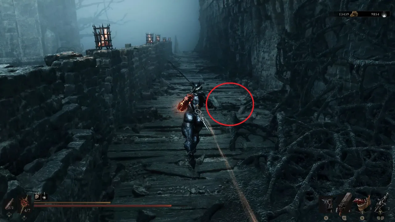 Image showing a Mortal Shell 2 player running through a path with a red circle highlighting a bear trap to the right
